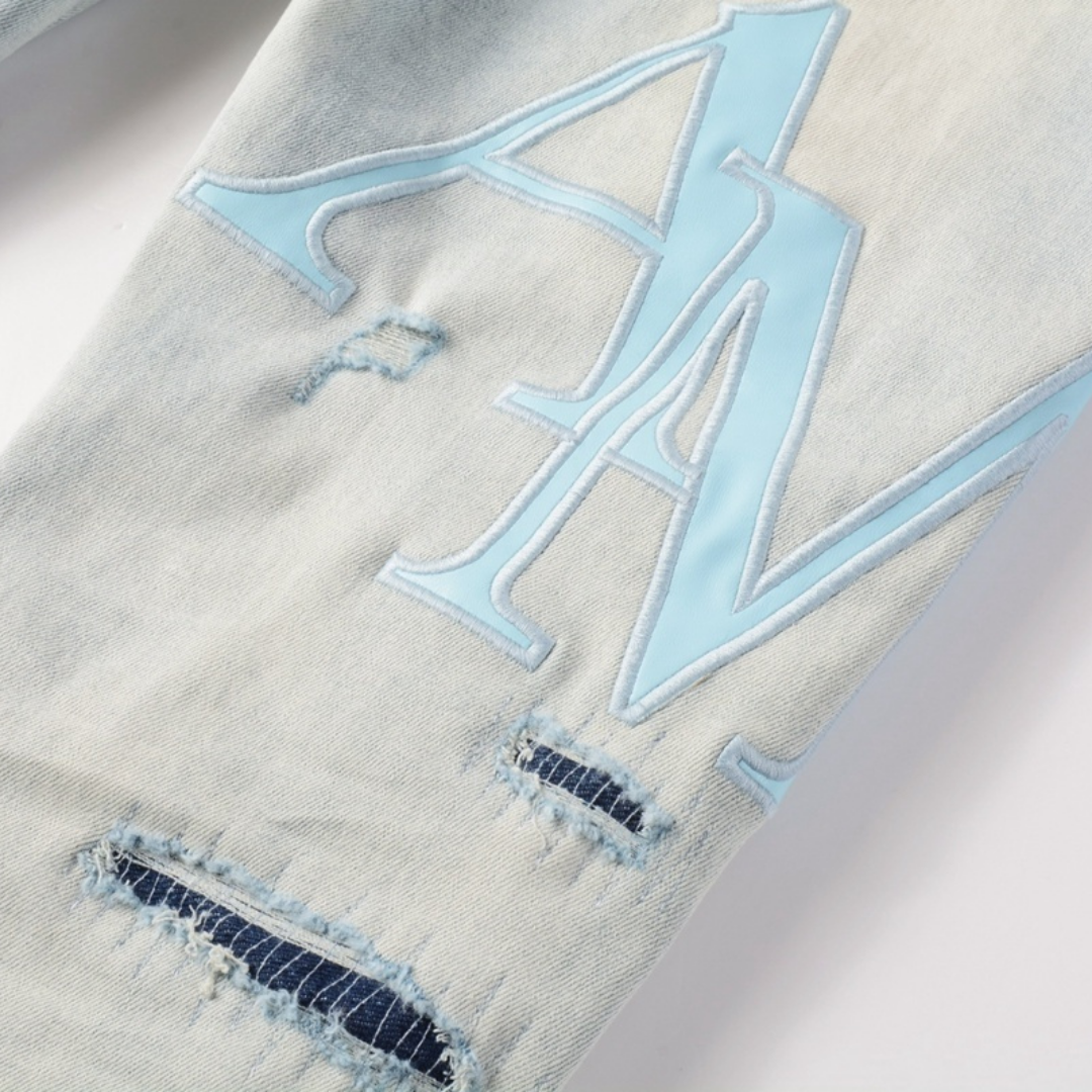 Staggered Light Blue Jeans