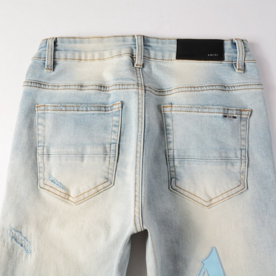 Staggered Light Blue Jeans